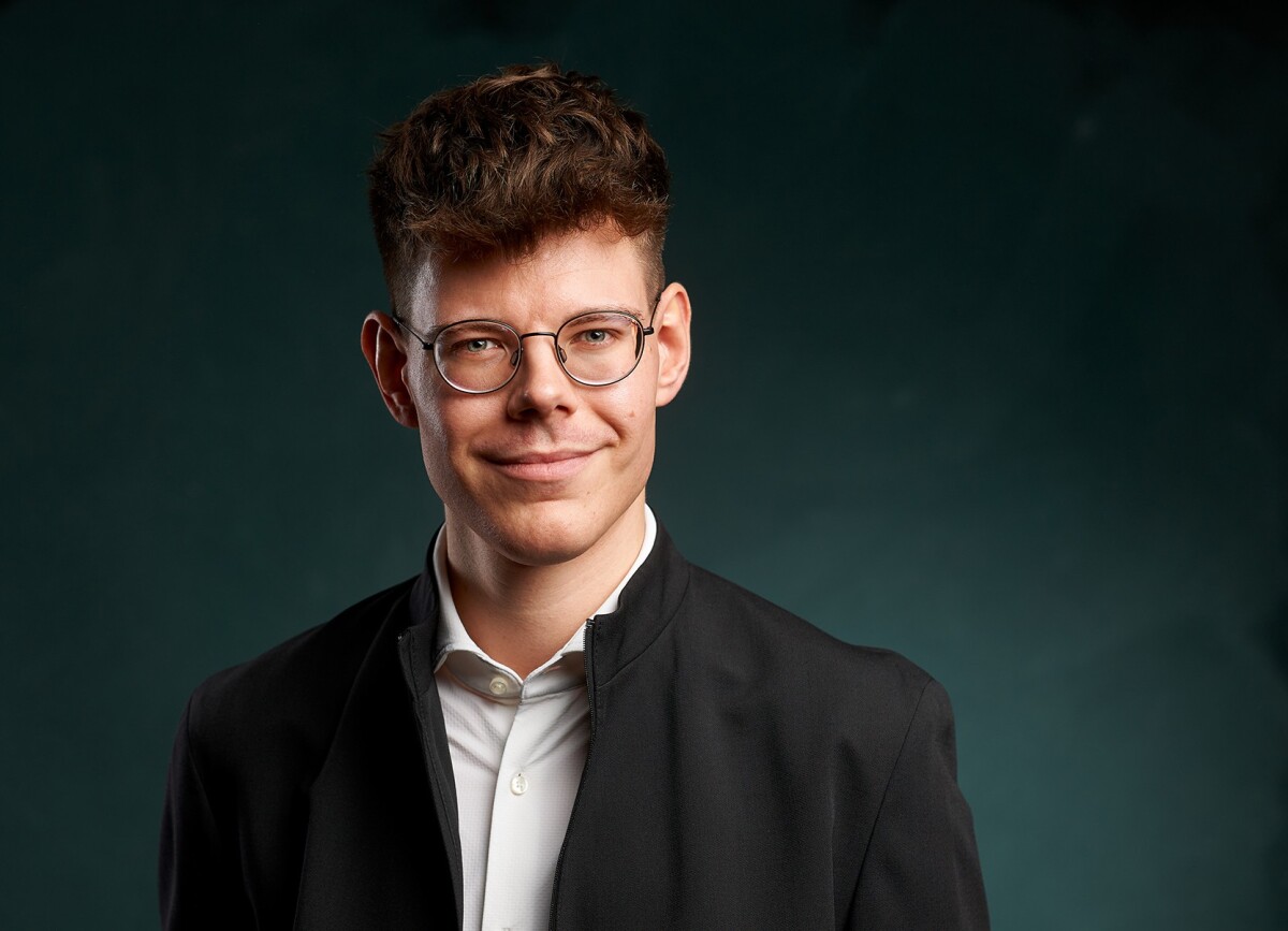 This photo shows a headshot of Dr. Joel Guttke