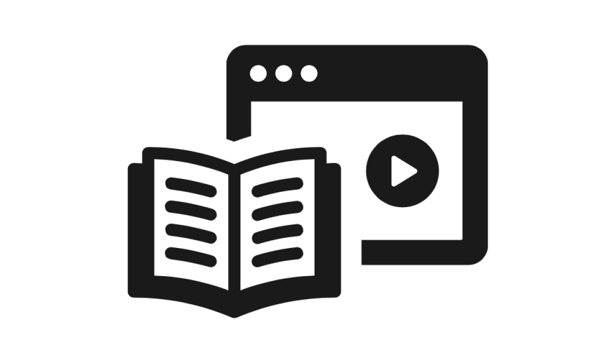 Ein Browser-Tab mit einem Video wird hinter einem aufgeschlagenen Buch dargestellt.