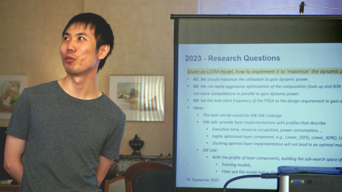 Chao Qian holds a presentation