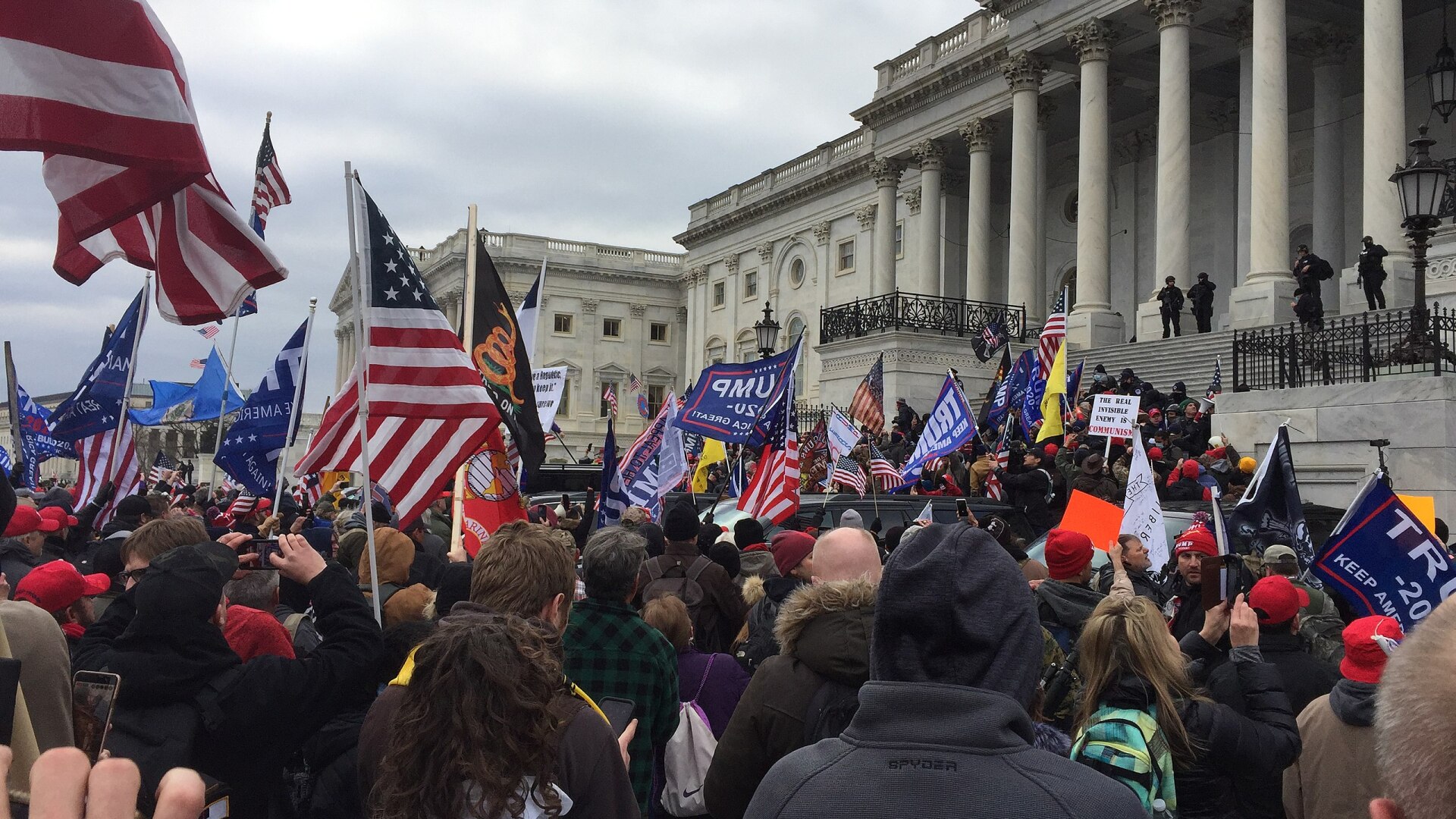 Crowd of Trump supporters marching on the US Capitol on 6 January 2021, ultimately leading the building being breached and several deaths.