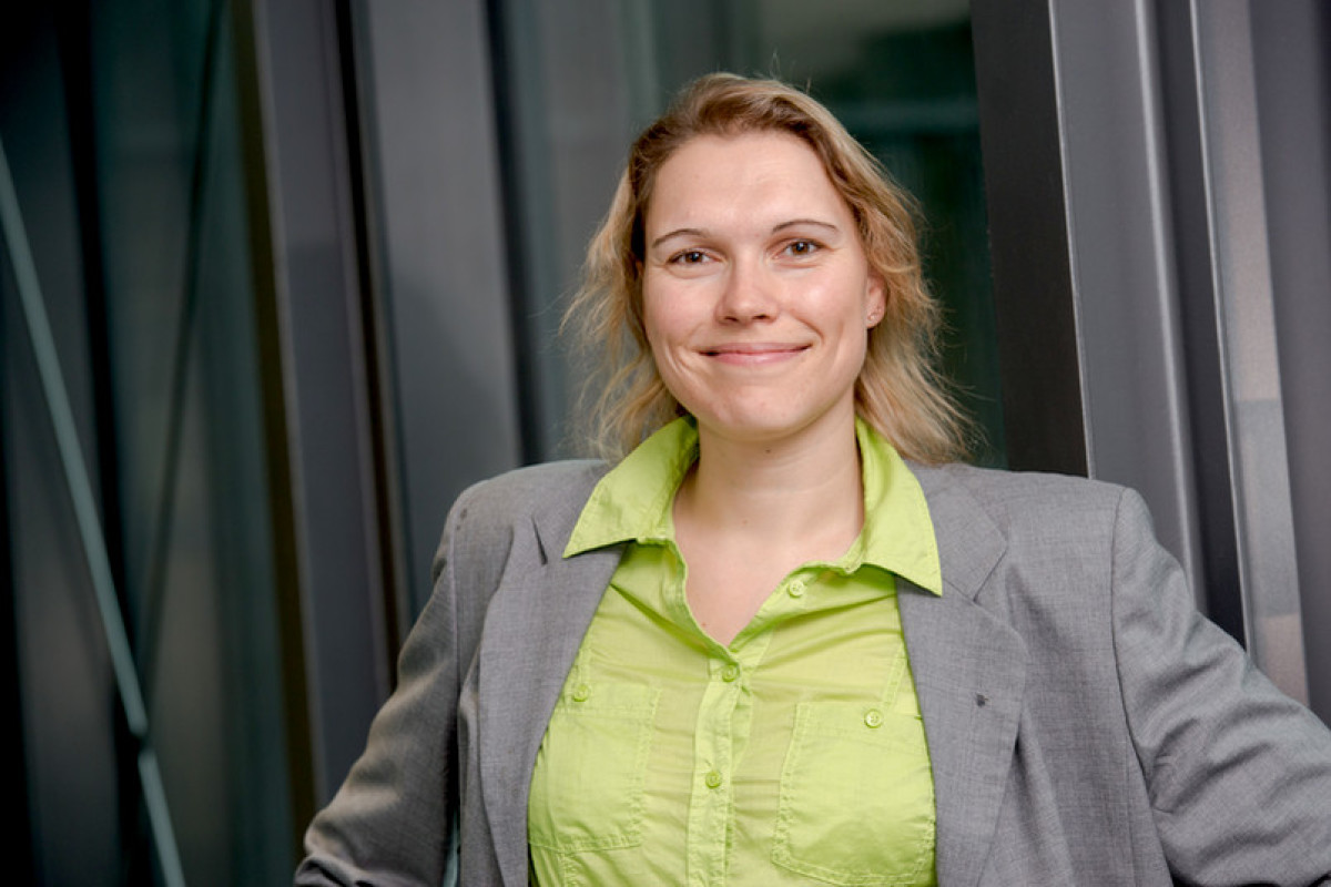 Professor Kristina Tschulik smiling in the camera